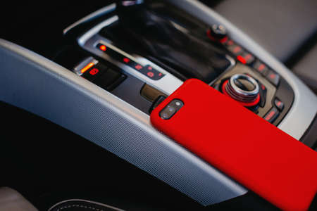 Smartphone on the modern car interior.の写真素材