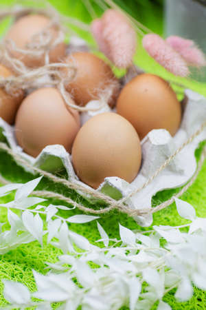 Easter eggs in a tub close up.の写真素材