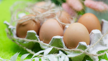 Easter eggs in a tub close up.の写真素材