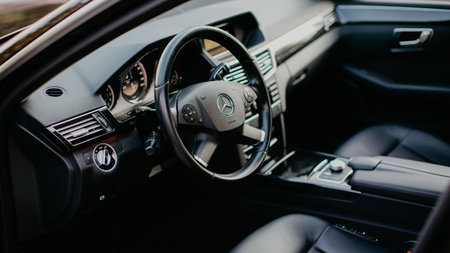 Stuttgart, Germany - January 23, 2020: Original Mercedes E-class W212 interior, avantgarde, Mercedes logo, dash board.のeditorial素材