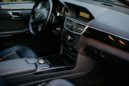 Stuttgart, Germany - January 23, 2020: Original Mercedes E-class W212 interior, avantgarde, Mercedes logo, dash board.のeditorial素材