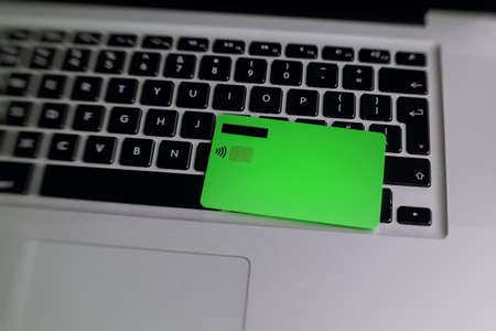 Credit card on computer laptop keyboard with copy space.の写真素材