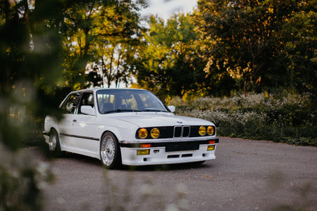 Berlin, Germany - July 07, 2020: BMW M3 e30 outdors, BBS wheels, tunning M Tech, glossy and shiny...