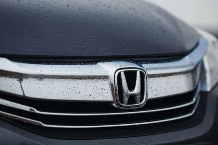 Rivne, Ukraine - 03, 28, 2021: Honda Accord 9 steering wheel with logo and speedometer.のeditorial素材