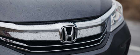 Rivne, Ukraine - 03, 28, 2021: Honda Accord 9 steering wheel with logo and speedometer.のeditorial素材