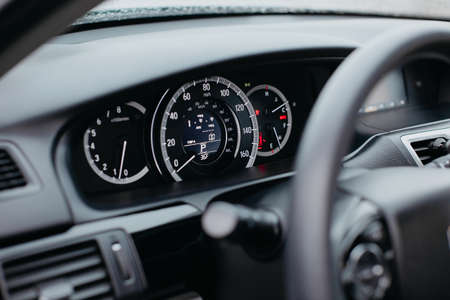 Rivne, Ukraine - 03, 28, 2021: Honda Accord 9 steering wheel with logo and speedometer.