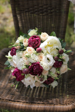 Wedding bouquet of white and pink roses and peoniesの写真素材