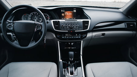 Modern car interior. Steering wheel, shift lever and dashboard. Detail of modern car interior. Automatic gear stick.の写真素材