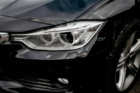 Broken headlight of a modern car.の写真素材