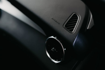 Close up shot of a modern car air conditioner in a car