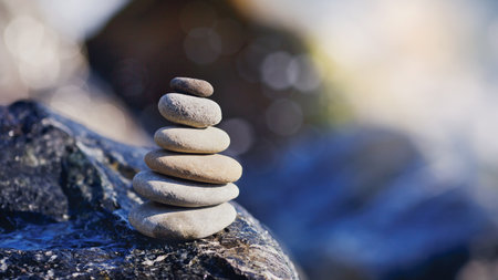 Stack of zen stones on the beach. Zen concept. Selective focus.の写真素材