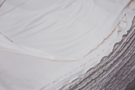 Close up of white crepe paper texture background. Shallow depth of field.の写真素材