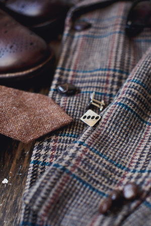 Men's clothing and accessories on a wooden background, close-upの写真素材