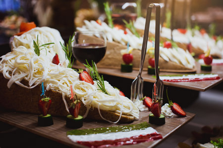 catering wedding buffet with different kinds of delicious sweets and treats