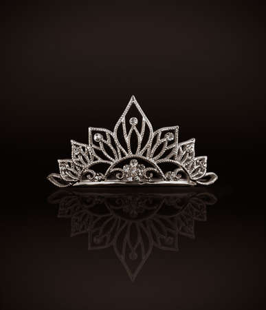 Tiara or diadem with reflection on dark backgroundの写真素材