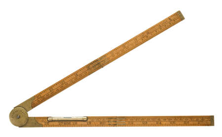 Antique carpenter's boxwood folding rule of 19th century marked Rabone with brass level and protractor isolated on white with clipping path includedの写真素材