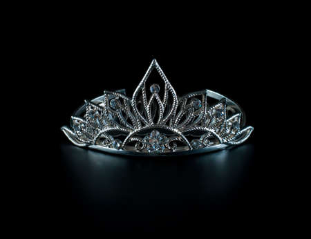 Tiara or diadem with reflection on dark backgroundの写真素材