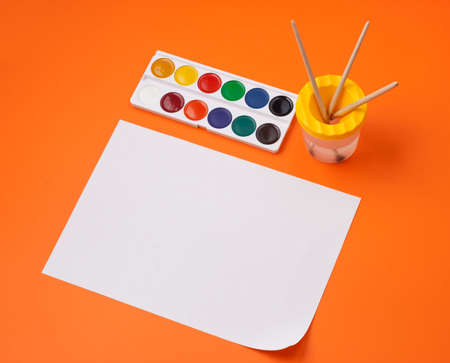 Still life with watercolour and empty paper sheet for you picture or textの写真素材