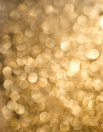 Abstract background of holiday glittering lightsの写真素材