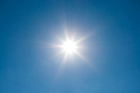 real sun in clear blue skyの写真素材