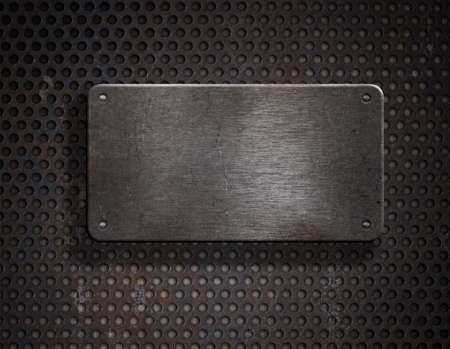 grunge rusty metal plate over grid backgroundの写真素材