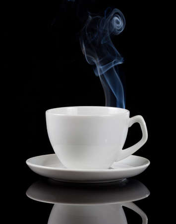 hot coffee cup with reflection on blackの写真素材