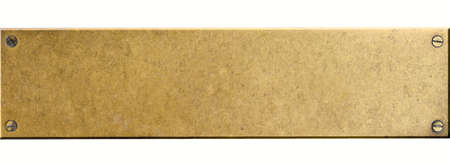Bronze metal plate with four screw bolts isolatedの写真素材