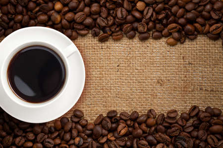 coffee cup on burlap background