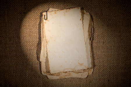 old photos bunch over burlap texture as a template for your picture