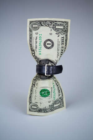 tighten belt on dollar conceptの写真素材