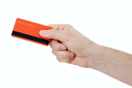 hand holding retail or credit card with magstripe