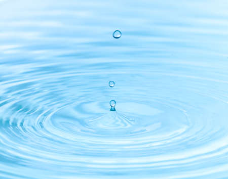 Splash of water drop closeupの写真素材