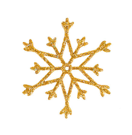 golden snowflake isolated on white. christmas tree decoration.の写真素材