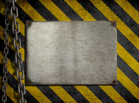 Grunge metal plate with yellow and black stripesの写真素材