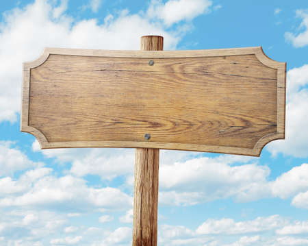 wood road sign on sky backgroundの写真素材