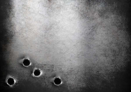 old grunge metal armor with bullet holesの写真素材