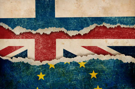 European union, British and Finland flags on cardboard piecesの写真素材