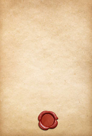 Old parchment paper background with red wax sealの写真素材