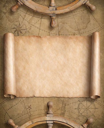 Old blank nautical map with steering wheelsの写真素材