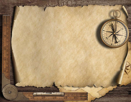 Old blank map background with compass. Adventure or discovery concept.の写真素材
