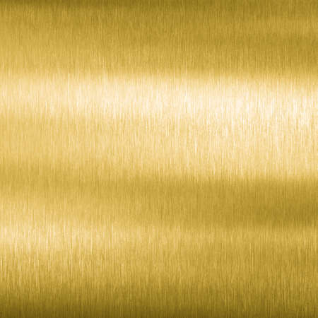 Golden brushed metal texture or backgroundの写真素材