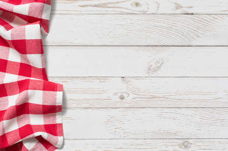 table with red picnic cloth top view backgroundの写真素材