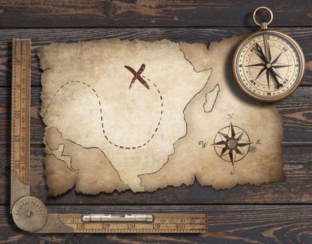 Old blank map background with compass. Adventure or discovery concept.の写真素材