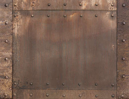 old rusty metal background with rivetsの写真素材