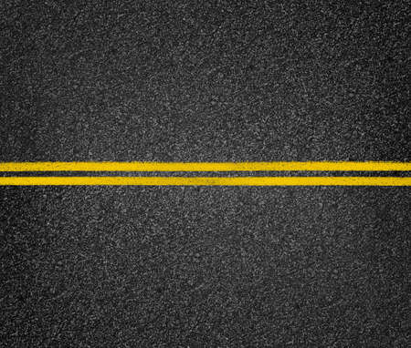 Road top view. Asphalt highway yellow marks.の写真素材