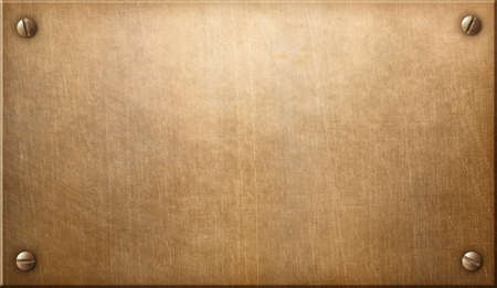 old copper or bronze metal plate with rivetsの写真素材