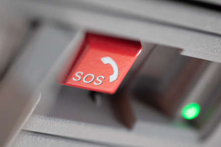 Emergency sos button close up which is used for help after car accidentの写真素材