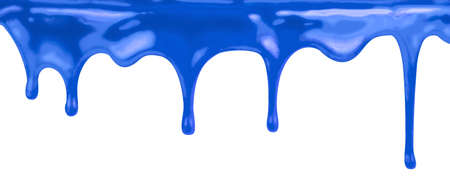 liquid blue paint dripping on white backgroundの写真素材