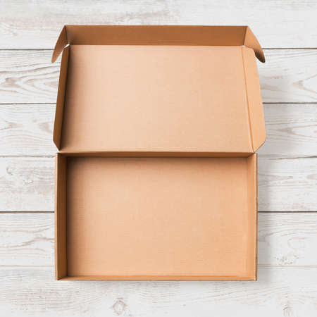 Open cardboard box top view isolated with no shadows clipping path includedの写真素材