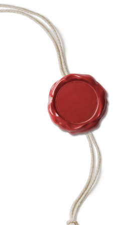 Red wax seal with thread isolated on whiteの写真素材